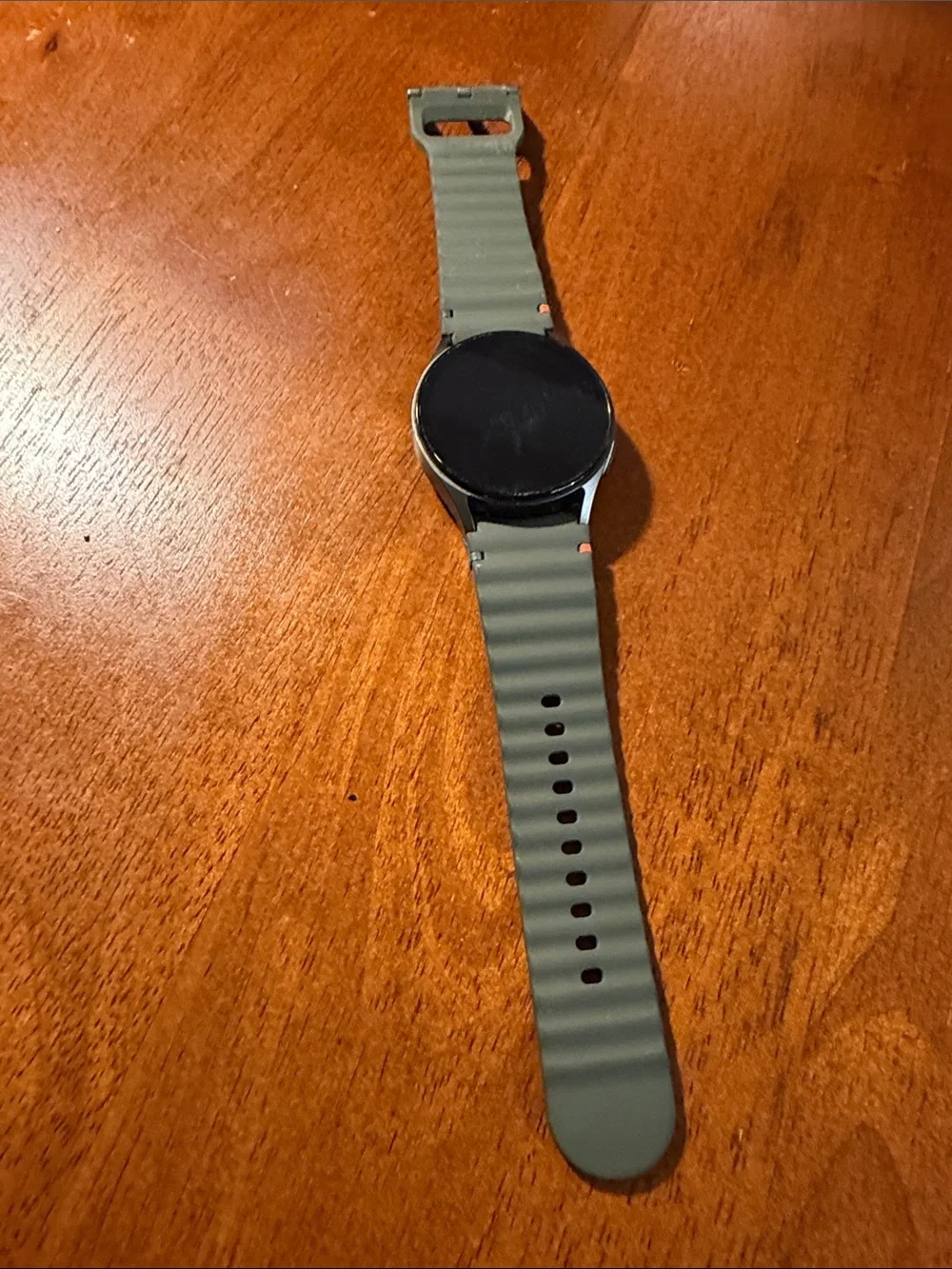 Samsung Round Smartwatch with Olive Green Silicone Strap and Silver Case